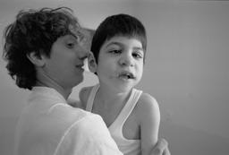 Davide with boy in a mental institution