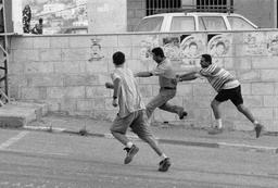 Soccer match on a curfew break