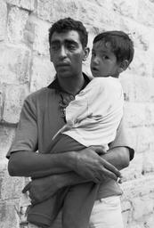 Man with a mutilated child