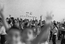 Askar, schoolchildren gathering in a gym