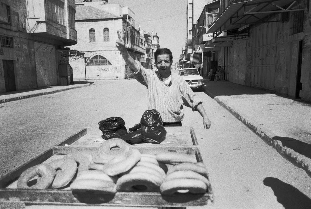 Bread seller on duty during curfew